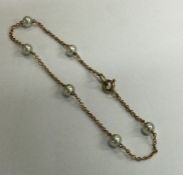 A 9 carat pearl mounted bracelet. Approx. 5.6 gram