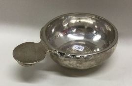 An early 19th Century Continental silver bleeding bowl. Approx. 115 grams. Est. £150 - £200.