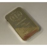 A silver 20 gram ingot. Approx.20 grams. Est. £20 - £30.