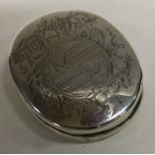OF WESTCOUNTRY INTEREST: A large oval early 18th Century silver tobacco