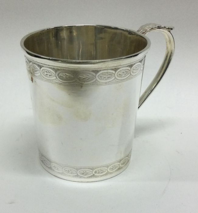 A fine engraved silver christening mug. Sheffield 1928. By James Dixon and Sons. Approx. 136 - Image 2 of 2