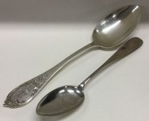A heavy 800 Standard silver spoon together with on
