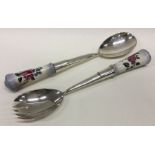 A pair of tapering silver salad servers. Est. £50