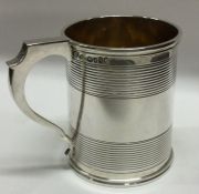 A Victorian reeded silver tankard with gilt interior. London 1871. By William Eley. Approx. 193