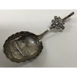 A Continental silver spoon embossed with a boat. Approx. 28 grams. Est. £60 - £80.