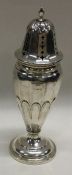 A heavy silver mounted caster with fluted decorati