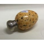 A silver mounted egg shaped scent bottle. Birmingham 1903. By CS&FS. Approx. 36 grams. Est. £