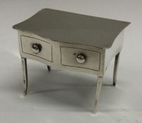 CHESTER: A rare silver hinged box in the form of a table. 1920. By Joseph and Richard Griffin.