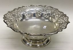 An attractive pierced silver fruit bowl with shape