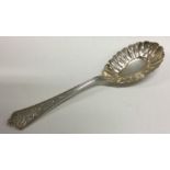 A fine quality American silver ice cream spoon chased with flowers. Approx. 77 grams. Est. £100 - £