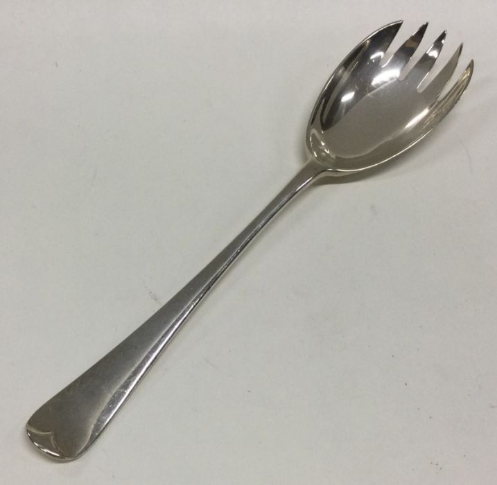 An OE pattern silver salad server. London. Approx.