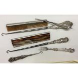 Two silver mounted combs etc. Est. £20 - £30.