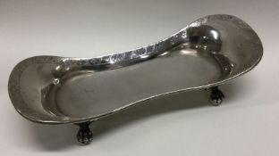 A large 19th Century silver snuffer’s stand on claw feet. Assay scrape to base. Approx. 167 grams.