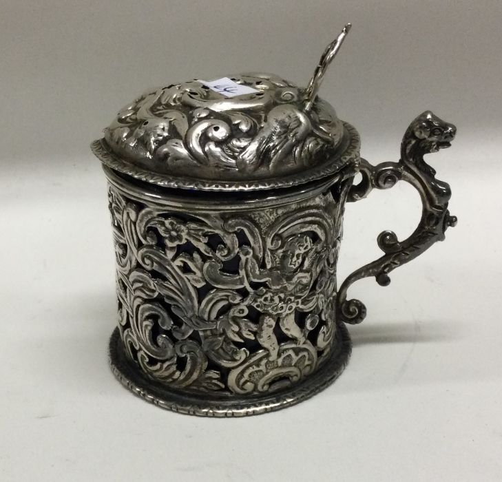 A Victorian silver mustard pot pierced with devils and birds. London 1890. By William Comyns. - Image 2 of 2