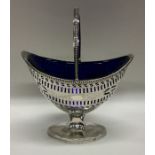 An attractive boat shaped silver sugar bowl with b