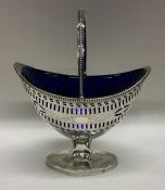 An attractive boat shaped silver sugar bowl with b