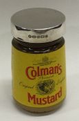 A silver mounted mustard pot. Est. £20 - £30.