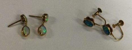 Two pairs of gold mounted opal earrings. Approx. 3