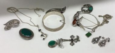 A quantity of silver bangles, rings etc. Approx. 1