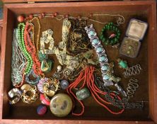 A cabinet containing costume jewellery. Est. £30 -