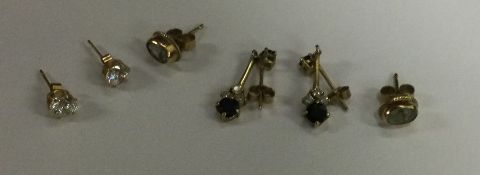 A quantity of gem set earrings. Approx. 3.1 grams.