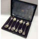 A cased set of six heavy silver souvenir spoons. B