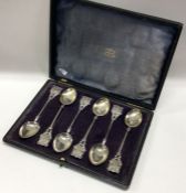 A cased set of six heavy silver souvenir spoons. B