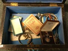 A box containing gold plated and other costume jew