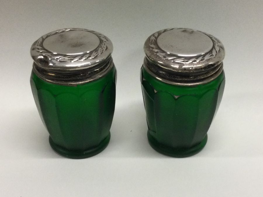 A pair of silver mounted green glass jars. Birmingham 1926. Est. £20 - £30. - Image 2 of 2