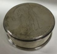A rare mid-18th Century snuff box with pull off lid and engraved decoration of a man with wings.