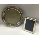 Two heavy plain silver picture frames. Est. £30 -