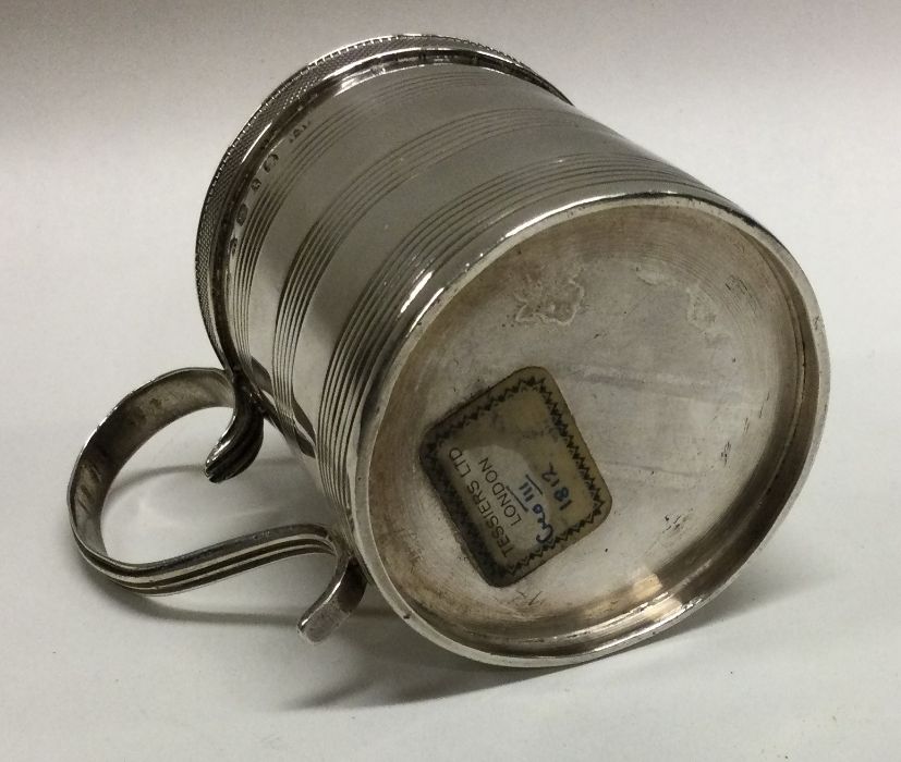 A George III silver christening mug with reeded decoration. London 1812. Retailed By Tessiers. - Image 2 of 2