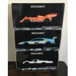 MINICHAMPS: Three various boxed model racing cars,