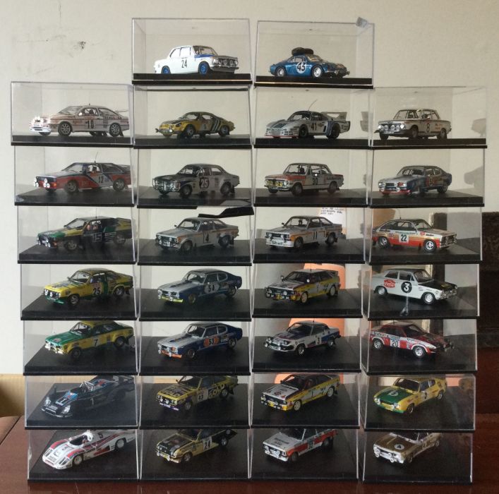 Thirty cased model racing cars. Est. £20-£30