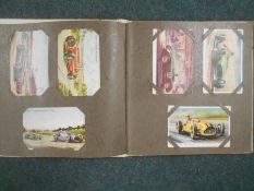 BOOKS: A POST CARD ALBUM with 24 racing cars, 31 trains, 21 aircraft, 30 ships. Est. £30 - £40.
