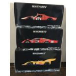 MINICHAMPS: Three various boxed model racing cars,