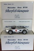 CMC: Three 1:18 scale boxed model racing cars. Est