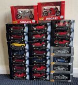 A quantity of various boxed Ferrari model racing c
