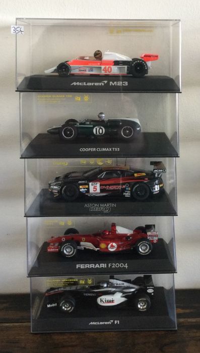 SCALEXTRIC: Five various boxed model racing cars.