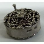 A novelty Victorian silver pierced tape measure. London 1890. By Charles Boyton.