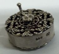 A novelty Victorian silver pierced tape measure. London 1890. By Charles Boyton.