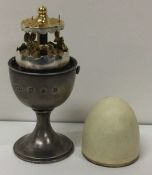 A rare silver and silver gilt ‘Surprise’ egg cup. 1980. By Anthony Gordon Elson. Approx. 191 grams.