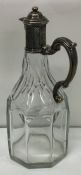 PAUL DE LAMERIE STYLE: An early 18th Century silver mounted liqueur bottle.