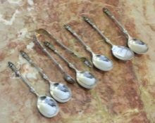 A good set of six silver teaspoons and tongs. Appr