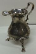 An 18th Century silver jug. Approx. grams. Est £80 - £120.