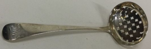 A Georgian silver pierced ladle. Est. £30 - £50.