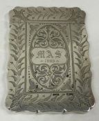 A Victorian silver card case engraved with leaves. Birmingham 1878. By Robert Thornton.