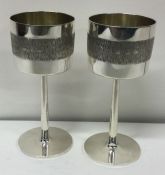 A pair of modernistic goblets of textured bark design. London 1971. By RAF. Approx. 347 grams. Est.