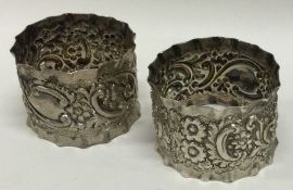 A pair of chased silver napkin rings. Birmingham. Approx. 50 grams. Est. £30 - £40.