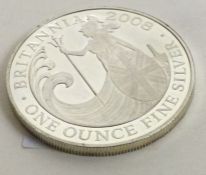 A one ounce Britannia silver coin. Approx. 31 grams. Est. £30 - £50.